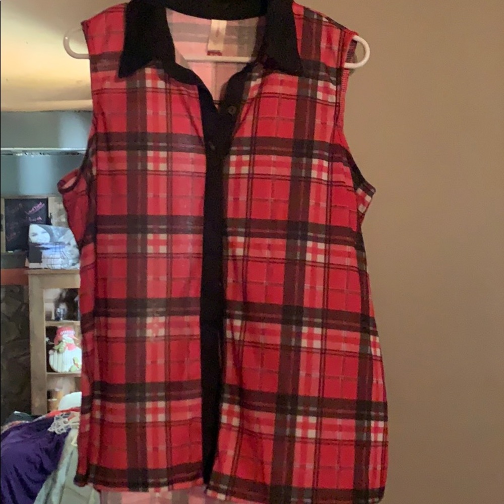 Button down sheer sleeveless shirt.  Never worn
